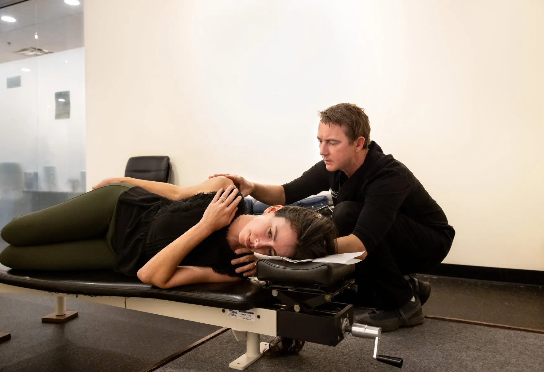Dr. McCanse performing gentle NUCCA spinal correction without twisting or cracking at a Vermont chiropractic clinic